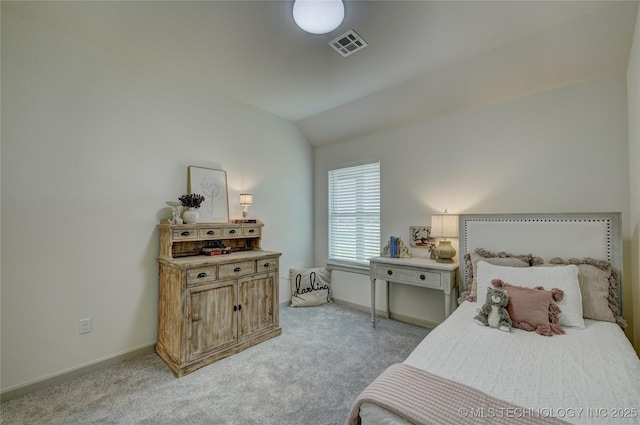 bedroom featuring light carpet, vaulted ceiling, visible vents, and baseboards