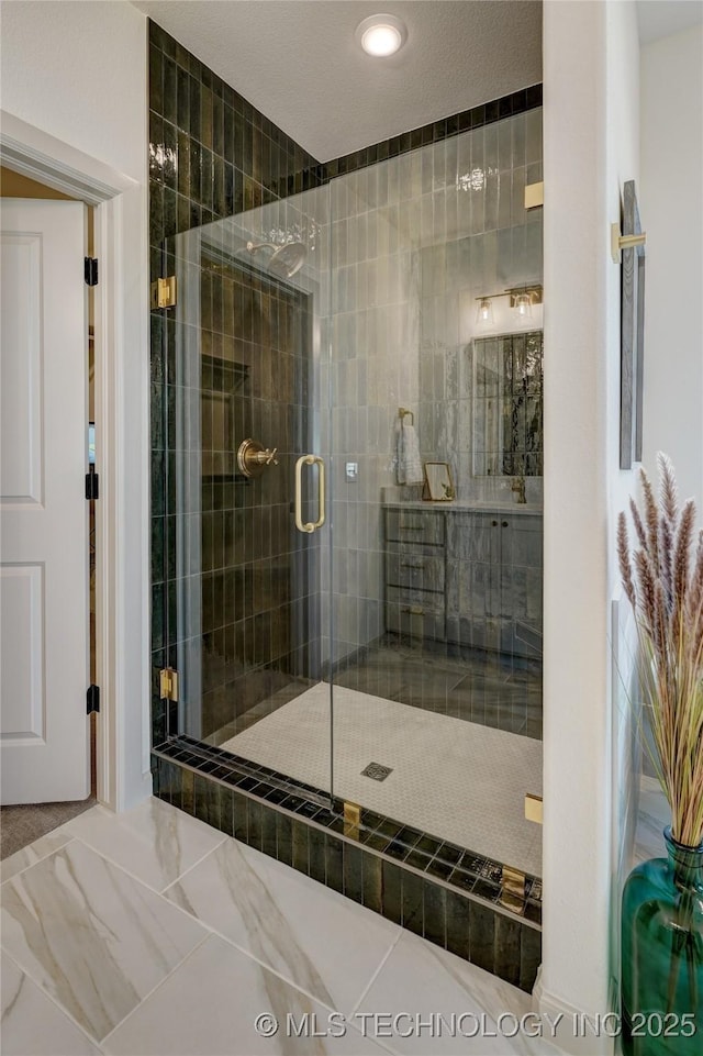 full bath featuring a shower stall