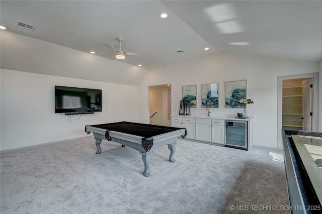 playroom with lofted ceiling, recessed lighting, beverage cooler, carpet flooring, and visible vents