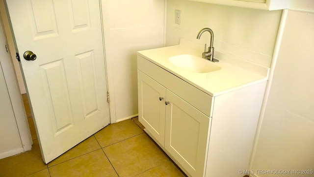 bathroom with vanity and tile patterned floors