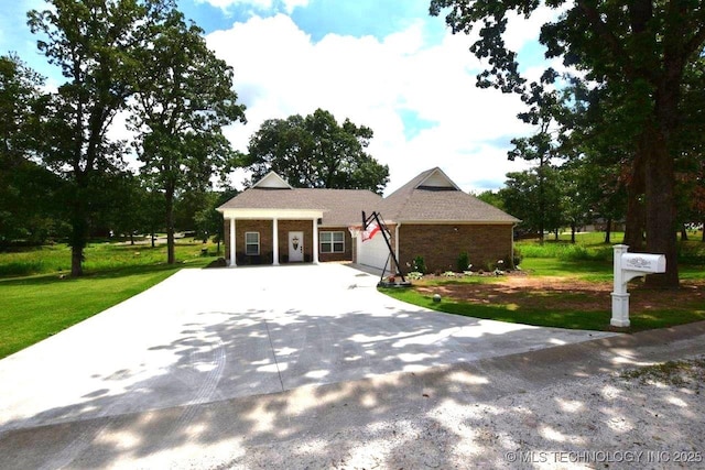 view of front facade with a garage, concrete driveway, brick siding, and a front lawn