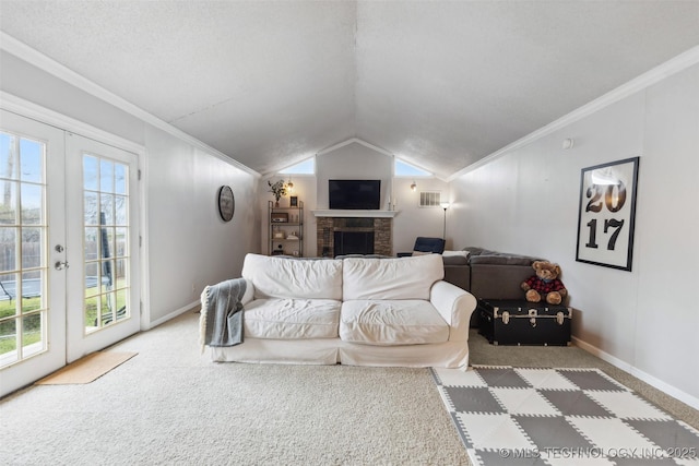 carpeted living area featuring crown molding, a wealth of natural light, and lofted ceiling