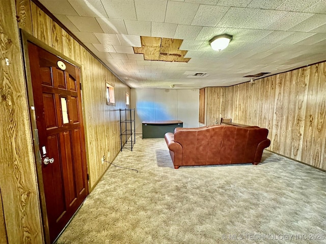 living room with billiards, wooden walls, visible vents, and carpet flooring