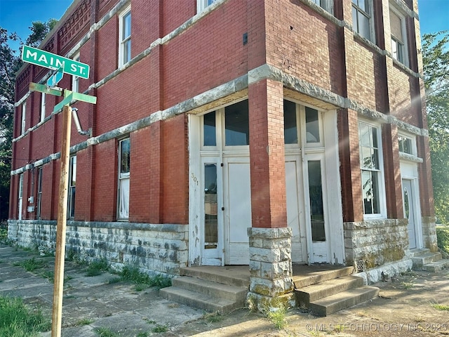 view of building exterior with entry steps