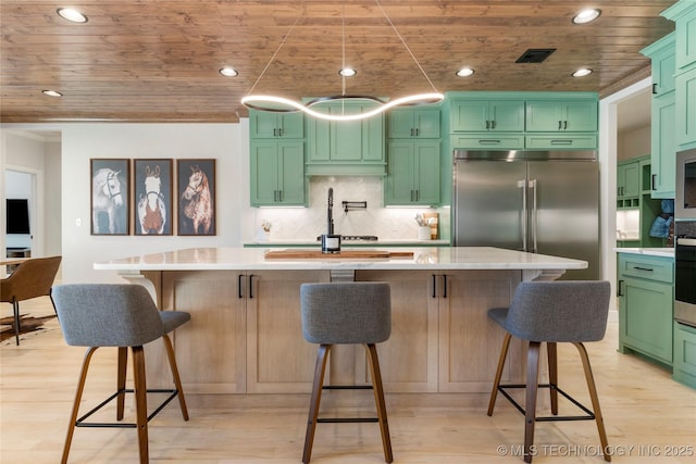 kitchen with tasteful backsplash, light countertops, visible vents, wood ceiling, and light wood-type flooring