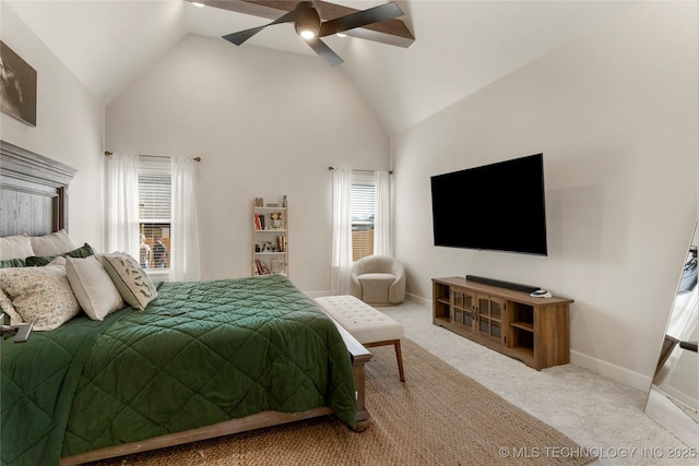 bedroom featuring high vaulted ceiling, carpet, ceiling fan, and baseboards