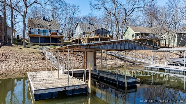 view of dock with a water view and stairway