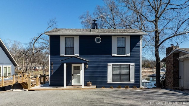 view of front of home featuring a wooden deck