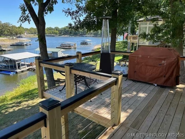 dock area with a water view