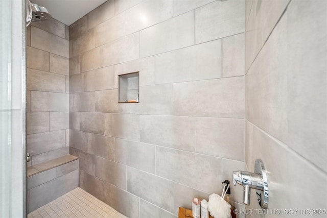 full bathroom with a tile shower