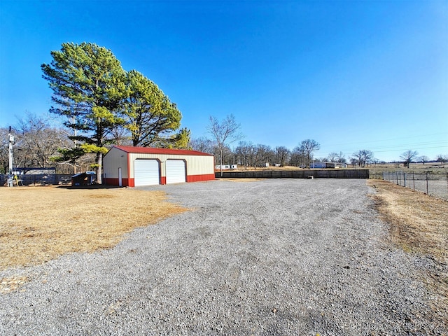 detached garage with fence