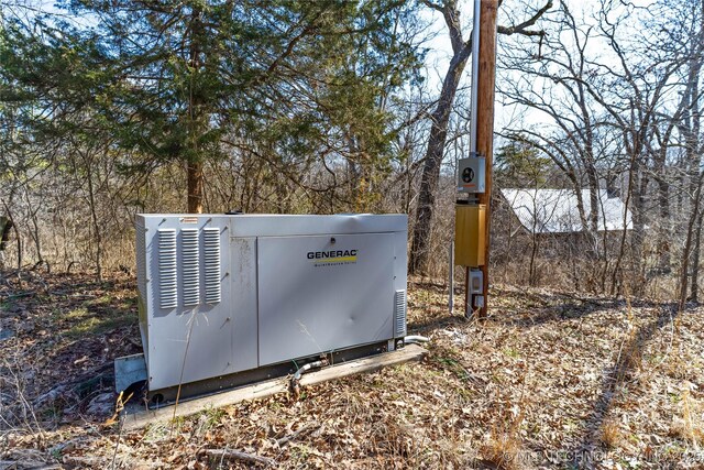 exterior details with electric meter and a power unit