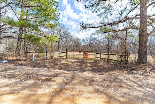 view of yard with a gate and fence