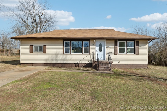 view of front of property with a front lawn