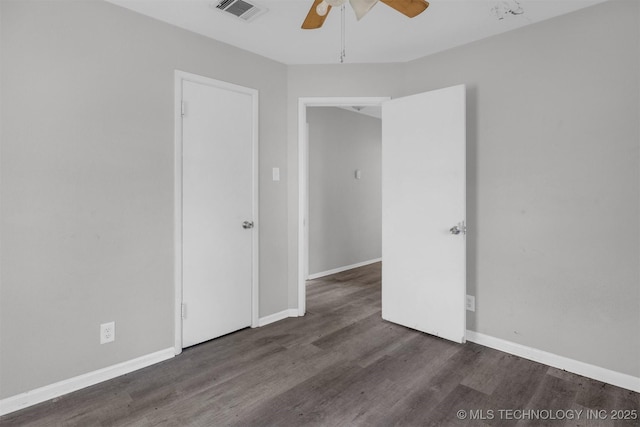 unfurnished bedroom with baseboards, visible vents, ceiling fan, and wood finished floors