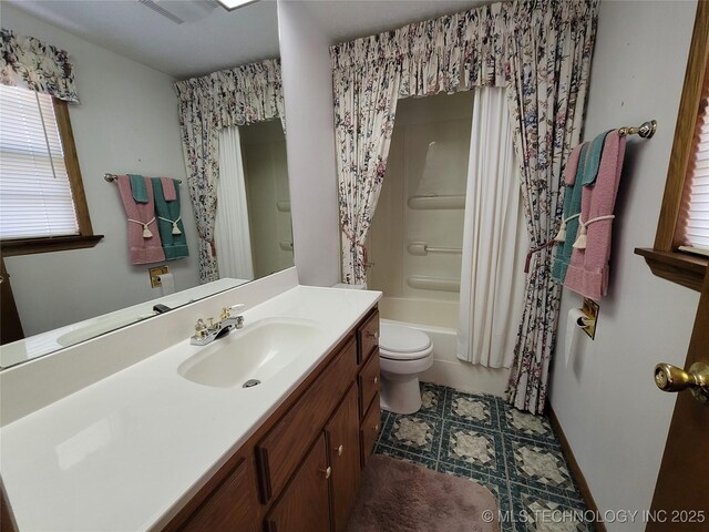 full bath with shower / bathtub combination with curtain, visible vents, vanity, and toilet