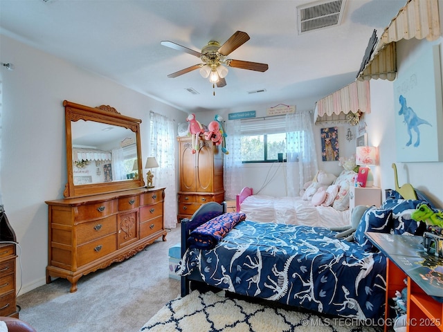 bedroom with ceiling fan, carpet flooring, and visible vents