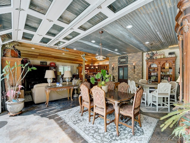 dining room featuring concrete flooring