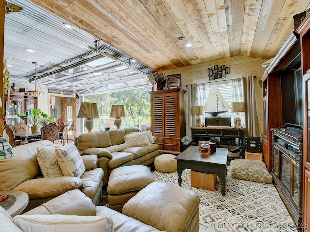 living area with wood ceiling, vaulted ceiling, and wooden walls