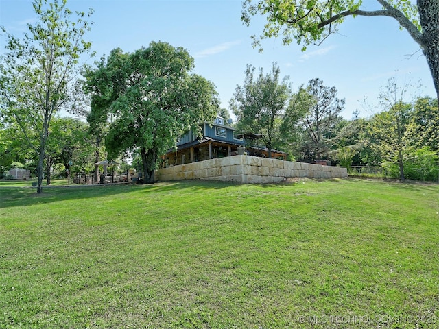 view of yard with fence