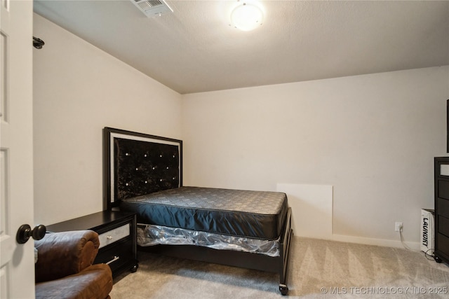 bedroom featuring carpet and visible vents