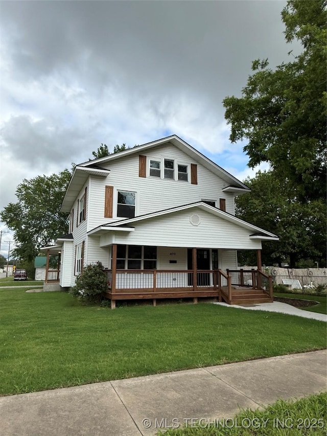 400 S Chickasaw Ave, Bartlesville, OK 74003 - view of front of home with a front lawn and a porch