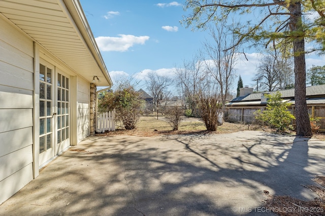 view of yard featuring a patio area and fence