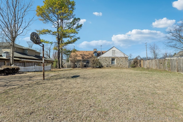 view of yard featuring fence