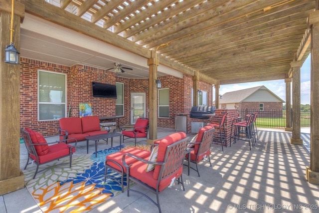 view of patio / terrace with ceiling fan, grilling area, fence, outdoor lounge area, and a pergola