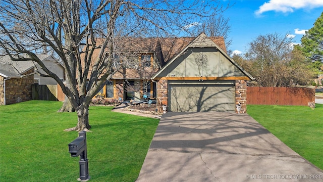 view of front of property with a garage, stone siding, driveway, and fence