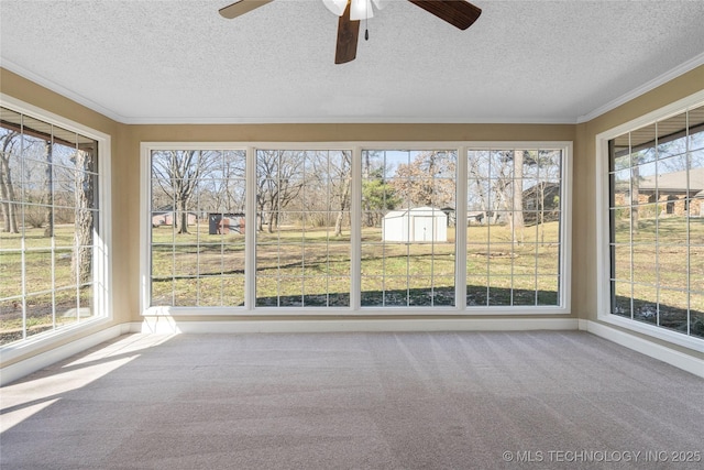 unfurnished sunroom with a wealth of natural light