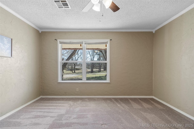 spare room with baseboards, visible vents, a textured wall, a textured ceiling, and carpet floors