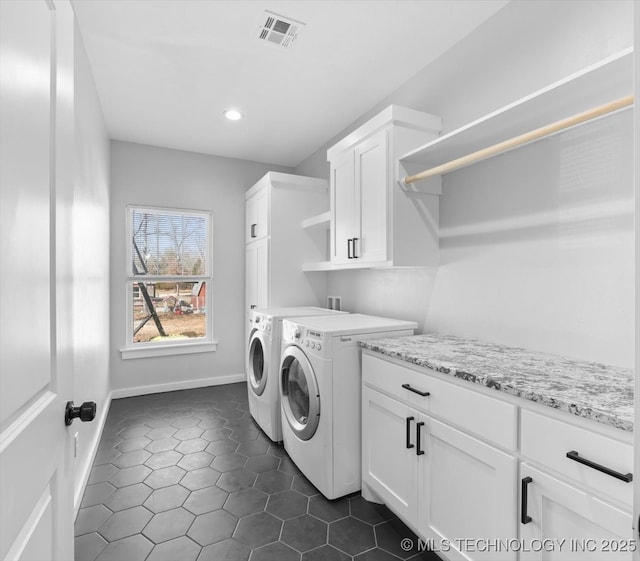 clothes washing area featuring cabinet space, baseboards, visible vents, washer and clothes dryer, and recessed lighting