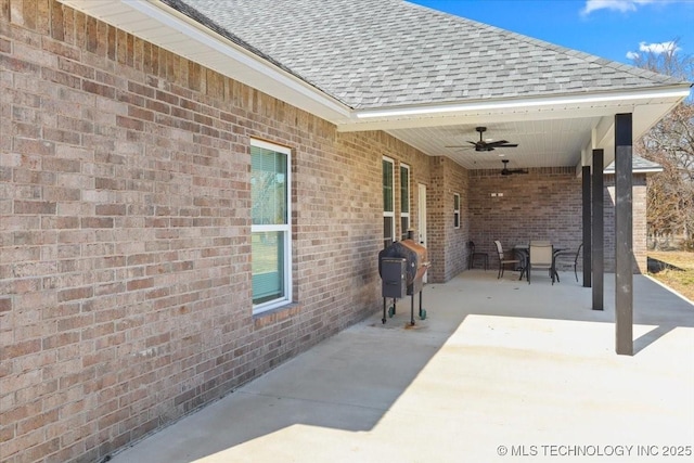 view of patio with ceiling fan and grilling area