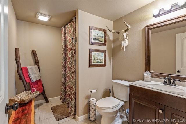 full bathroom with toilet, tile patterned floors, vanity, baseboards, and a shower with curtain