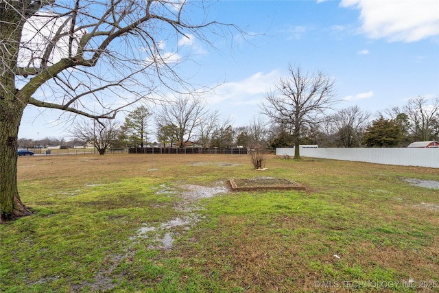 view of yard with fence