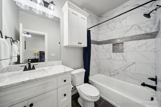 ensuite bathroom with shower / bath combo, ensuite bath, vanity, and toilet