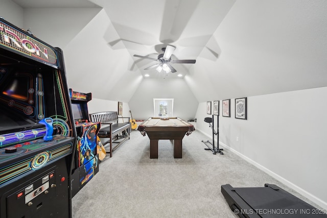 playroom with ceiling fan, baseboards, vaulted ceiling, and carpet flooring