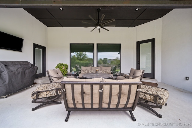 view of patio featuring ceiling fan and an outdoor hangout area