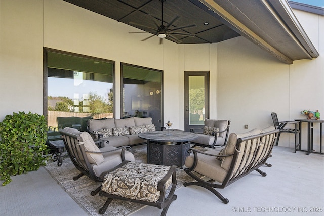 view of patio featuring outdoor lounge area and ceiling fan