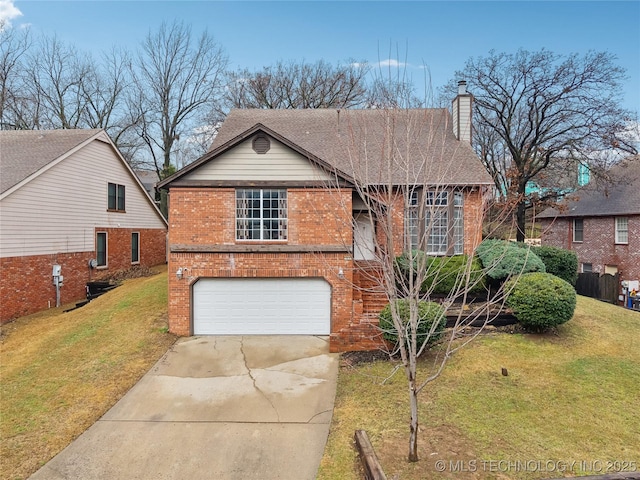 view of front of property with a garage, brick siding, driveway, and a front lawn