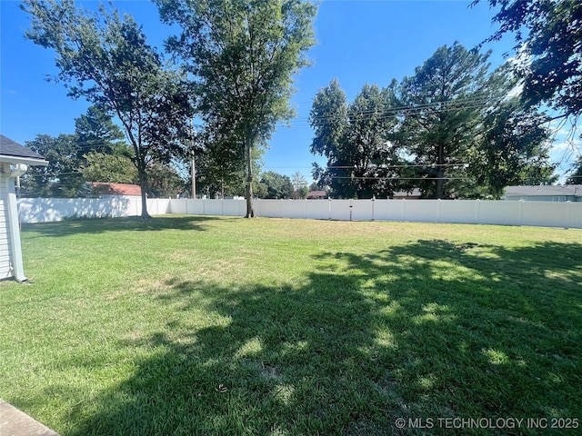 view of yard featuring fence