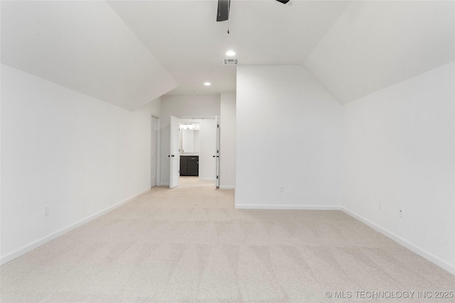 bonus room with recessed lighting, visible vents, light carpet, vaulted ceiling, and baseboards