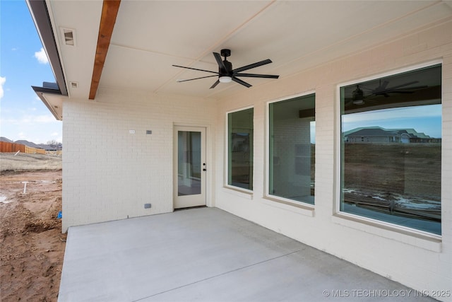 view of patio featuring a ceiling fan