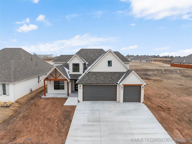 modern inspired farmhouse featuring board and batten siding, a shingled roof, concrete driveway, and an attached garage