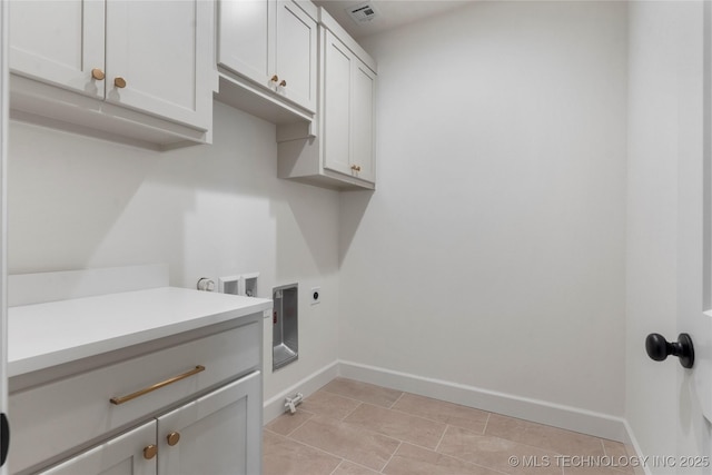 laundry area with cabinet space, visible vents, gas dryer hookup, hookup for a washing machine, and hookup for an electric dryer