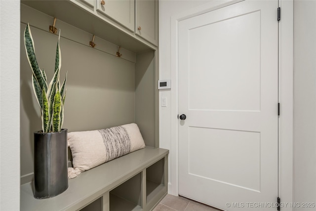 mudroom with light tile patterned floors