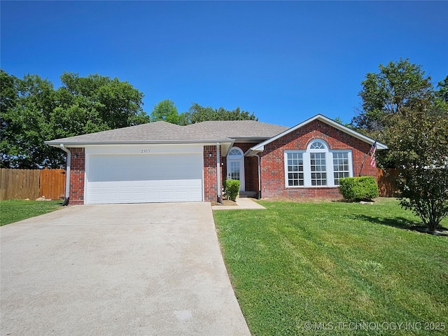 2517 Westwood, Ardmore, OK 73401 - ranch-style house with concrete driveway, a garage, and brick siding