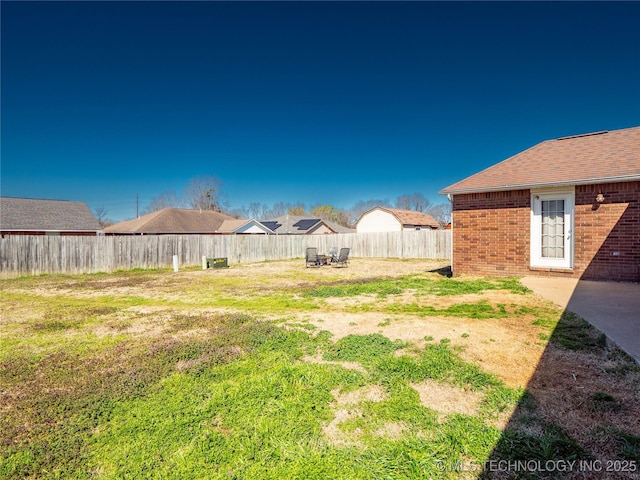 view of yard featuring a fenced backyard