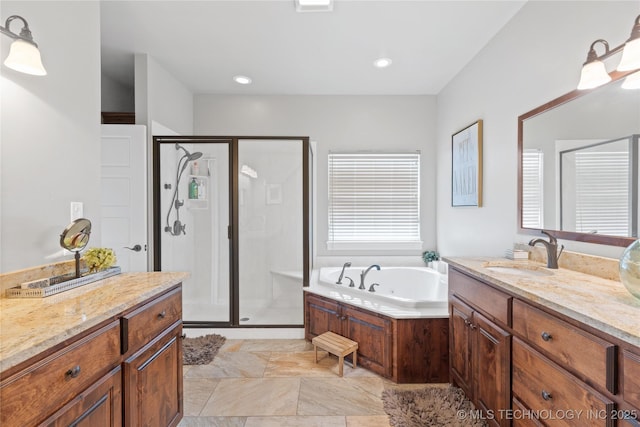 bathroom featuring a stall shower, vanity, recessed lighting, and a bath